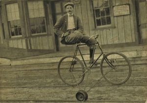 Joseph Pinkney on hi-rail bicycle